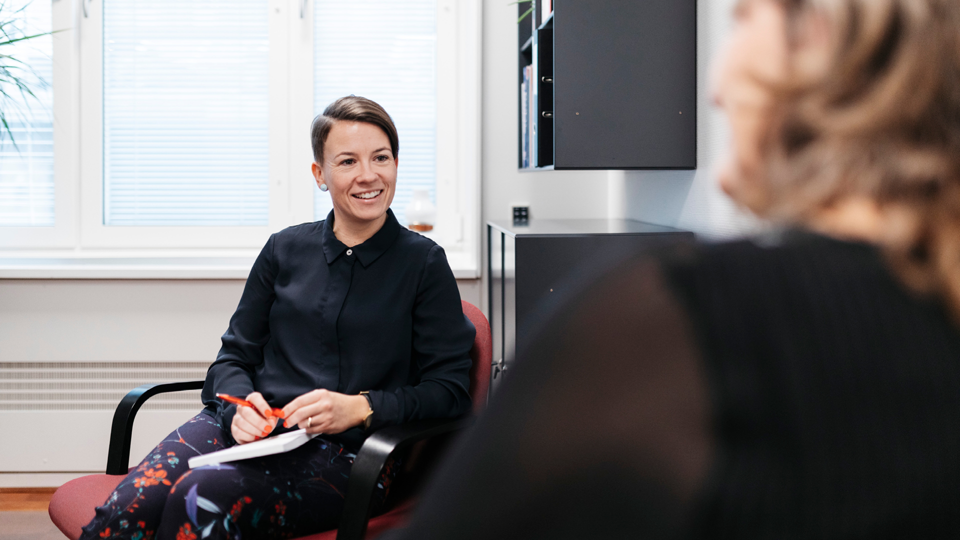 Employees in conversation with a career coach